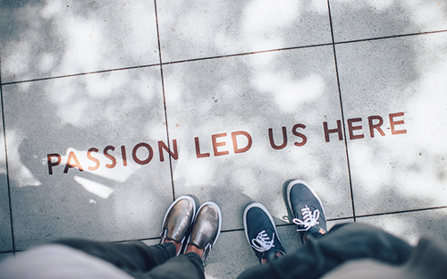 Passion led us here engraved on sidewalk